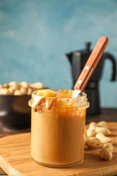 Yummy breakfast composition on wooden table against light background, space for text. Traditional product of American cuisine