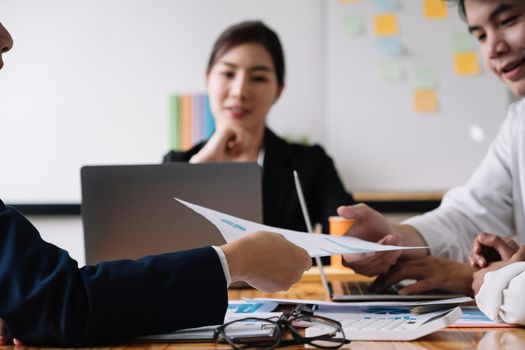 Shot of Business team working new startup project and discussing the charts and graphs showing the results at meeting accounting and financial