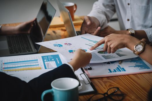 Shot of Business team working new startup project and discussing the charts and graphs showing the results at meeting accounting and financial