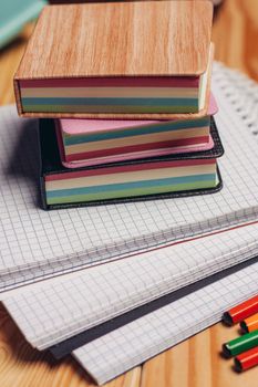 notepads colorful pencils office school items paper work. High quality photo