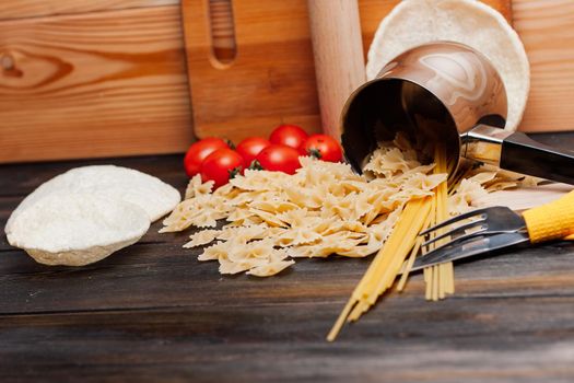 italian pasta and spaghetti cooking cherry tomatoes cuisine lunch. High quality photo