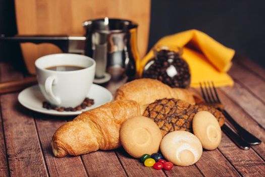 a cup of coffee sweets cookies desserts breakfast. High quality photo