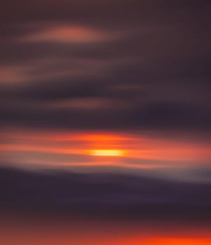 Blurred sunrise background, early morning light in mountains