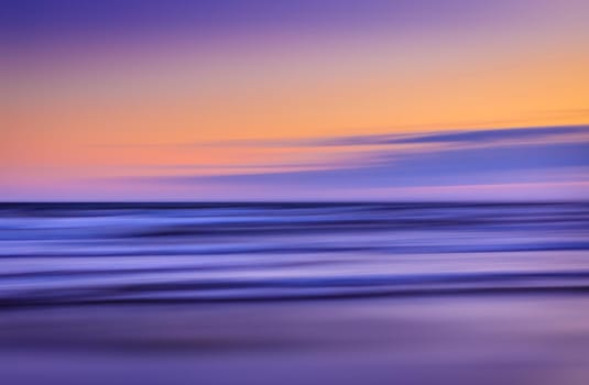 Abstract blurred sea landscape and sunset cloudy sky background