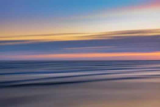 Abstract blurred sea landscape and sunset sky background