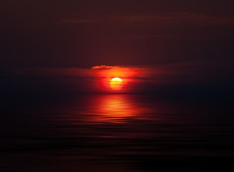 Sunset sky nature background with water reflection.