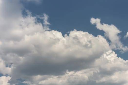 Beautiful white clouds on the blue sky