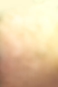 Defocused blurred image of colorful smoke on dark background. Texture and abstract art