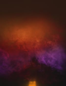 Soft focus abstract image of colorful smoke on dark background. Texture and abstract art