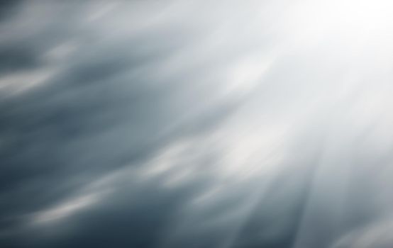 Defocused natural sky background with motion blur with sun light. Nature background