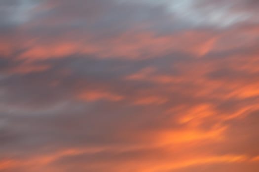 Blurred nature background. Smooth relax landscape. Abstract sunset sky with motion blurred clouds