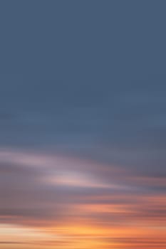 Blurred nature background. Smooth relax landscape. Abstract sunset sky with motion blurred clouds