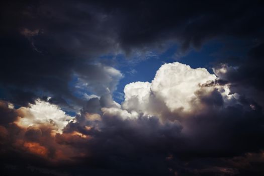 Dramatic sky with stormy clouds. Nature background