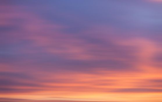 Blurred nature background. Blurred sunset cloudy sky background