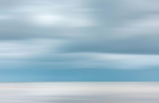 Blurred sea background. Nature background with water and clouds