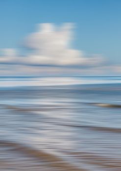 Abstract blurred sea and cloudy sky background