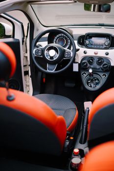 Photo The interior of the convertible car from the rear seat. Phot of the interior of a small convertible car