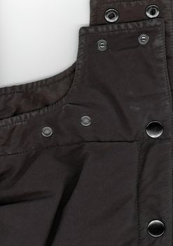 black fabric jacket with pusher (poussoir) buttons