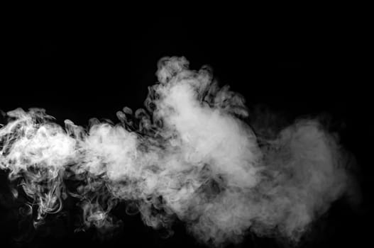 White smoke isolated on black background