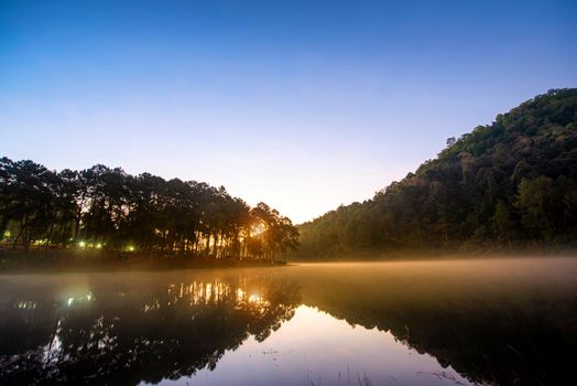 Morning light at Pang Ung (Pang Tong reservoir) in the mist at sunrise, Mae Hong Son province, Thailand,forest background. Concept Travel