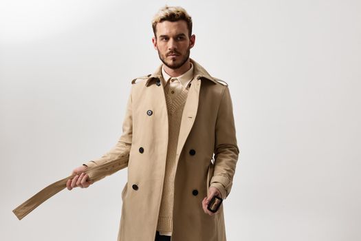 fashion man in beige blazer autumn style shirt. High quality photo