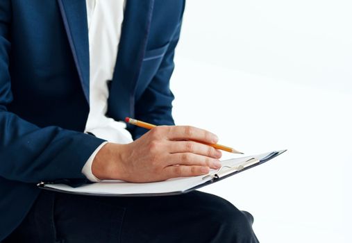 Business man with documents dad on lap Copy Space. High quality photo