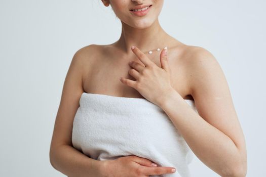 Beautiful brunette white towels clean skin spa treatments. High quality photo