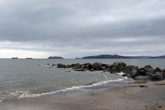 Seascape in cloudy weather with dramatic sky. Vladivostok, Primorsky Krai