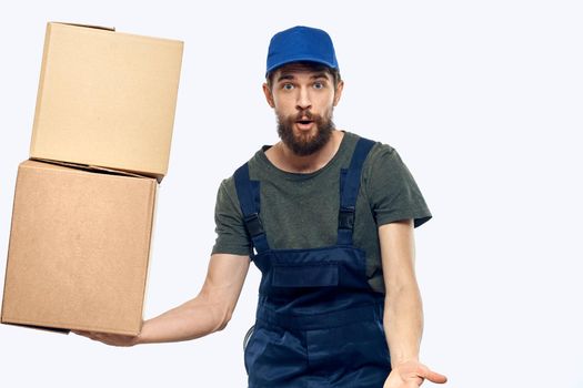 Man worker in uniform providing loading delivery service. High quality photo
