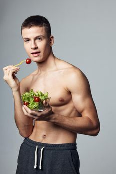 sport man healthy eating cropped view vegetarian isolated background. High quality photo