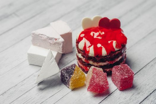 sweet round cake red velvet dessert snack wooden background. High quality photo