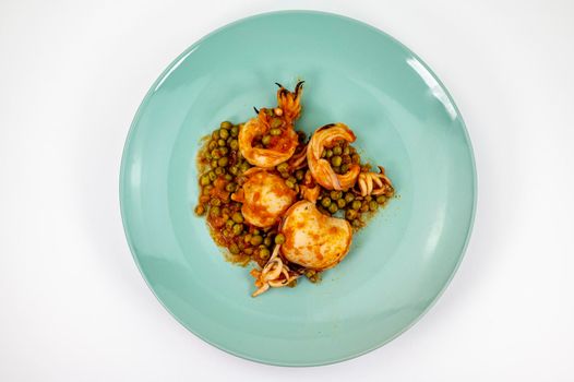 second course with cuttlefish and tomato peas on a white background