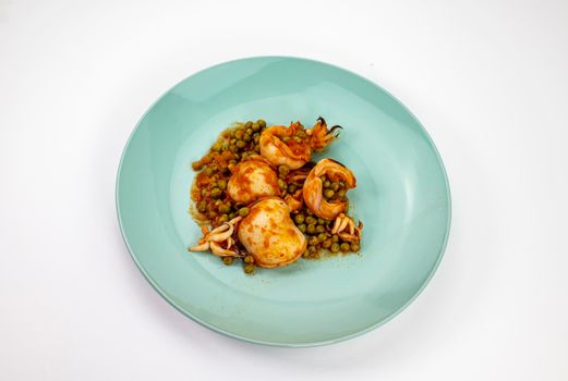 second course with cuttlefish and tomato peas on a white background