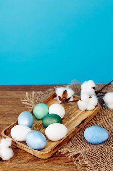 painted eggs holiday tradition spring easter blue background. High quality photo