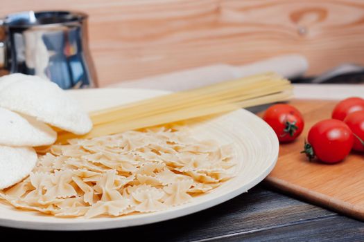 italian pasta cuisine cooking ingredients cherry tomatoes lunch. High quality photo