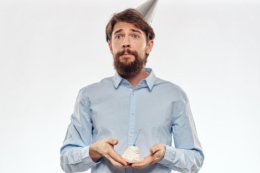 Happy guy with birthday cake white background Compact corporate party cropped beard view. High quality photo