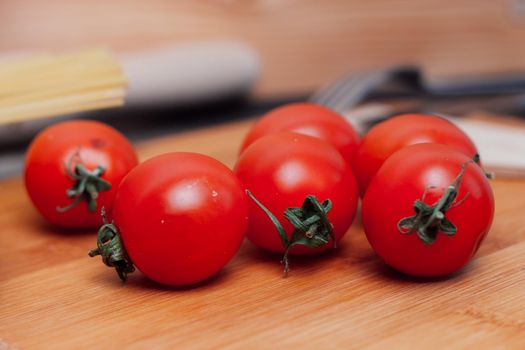 cherry tomatoes on the table italian pasta ingredients. High quality photo