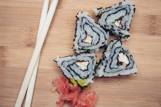 sushi chopsticks restaurant wood cutting board. High quality photo