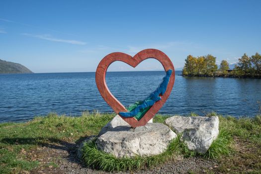 Slyudyanka, Irkutsk region. Sculpture of a heart on the shore of Lake Baikal.