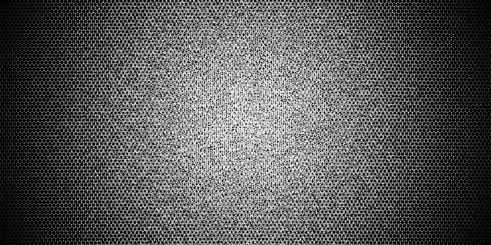 Halftone gradient made of white letters and digits randomly distributed on black background, abstract illustration