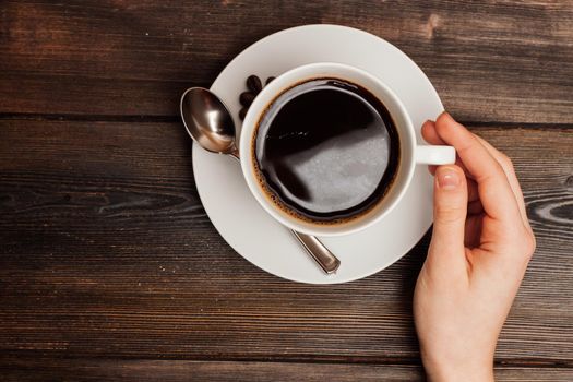 cup of coffee on a wooden table sweets breakfast top view. High quality photo