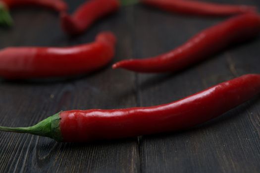 red chili seasoning kitchen wooden background spice. High quality photo