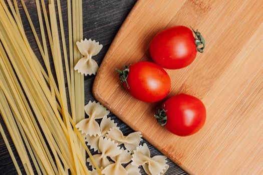 ingredients for making italian pasta cherry tomatoes cuisine. High quality photo