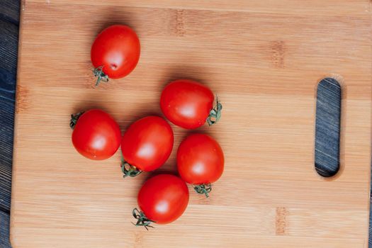 pasta on the kitchen table cherry tomatoes ingredients cooking italian. High quality photo