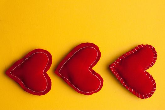 heart gift romance Valentine yellow background decoration. High quality photo