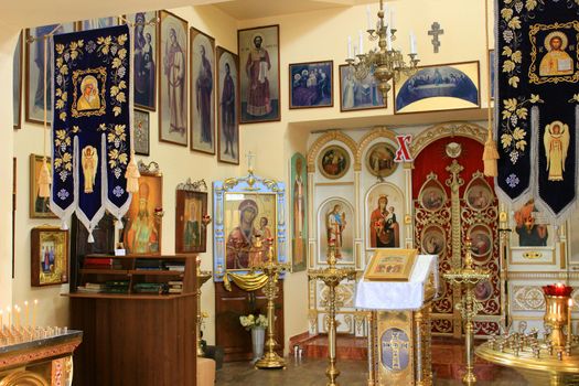 Christian faith. Decoration of the Orthodox church, candles and icons