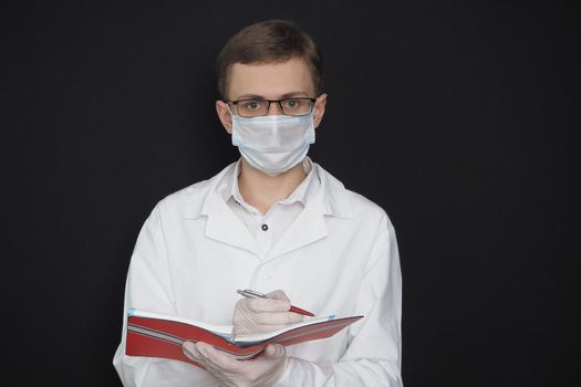 Science, medicine and education. Young researcher, doctor in medical robe mask and rubber gloves. High quality photo