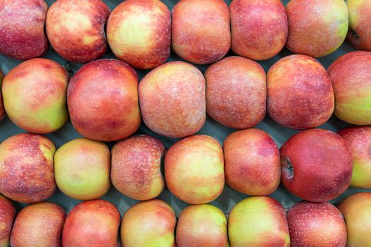 ripe apples close-up on the shelves of stores. High quality photo