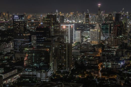 Bangkok, thailand - Aug 28, 2020 : Bangkok downtown cityscape with skyscrapers at night give the city a modern style. Selective focus.