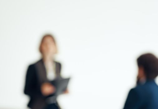 A man in a blue jacket for a job interview and a woman secretary suit model. High quality photo